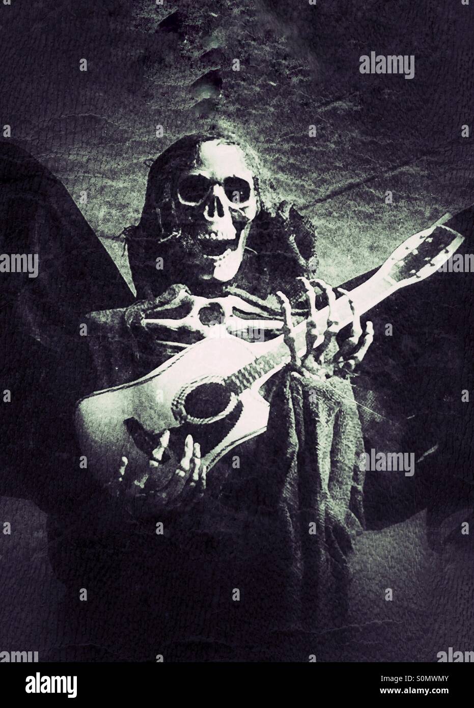 A skeleton Halloween decoration with guitar in hand - Smartphone Captured Stock Image