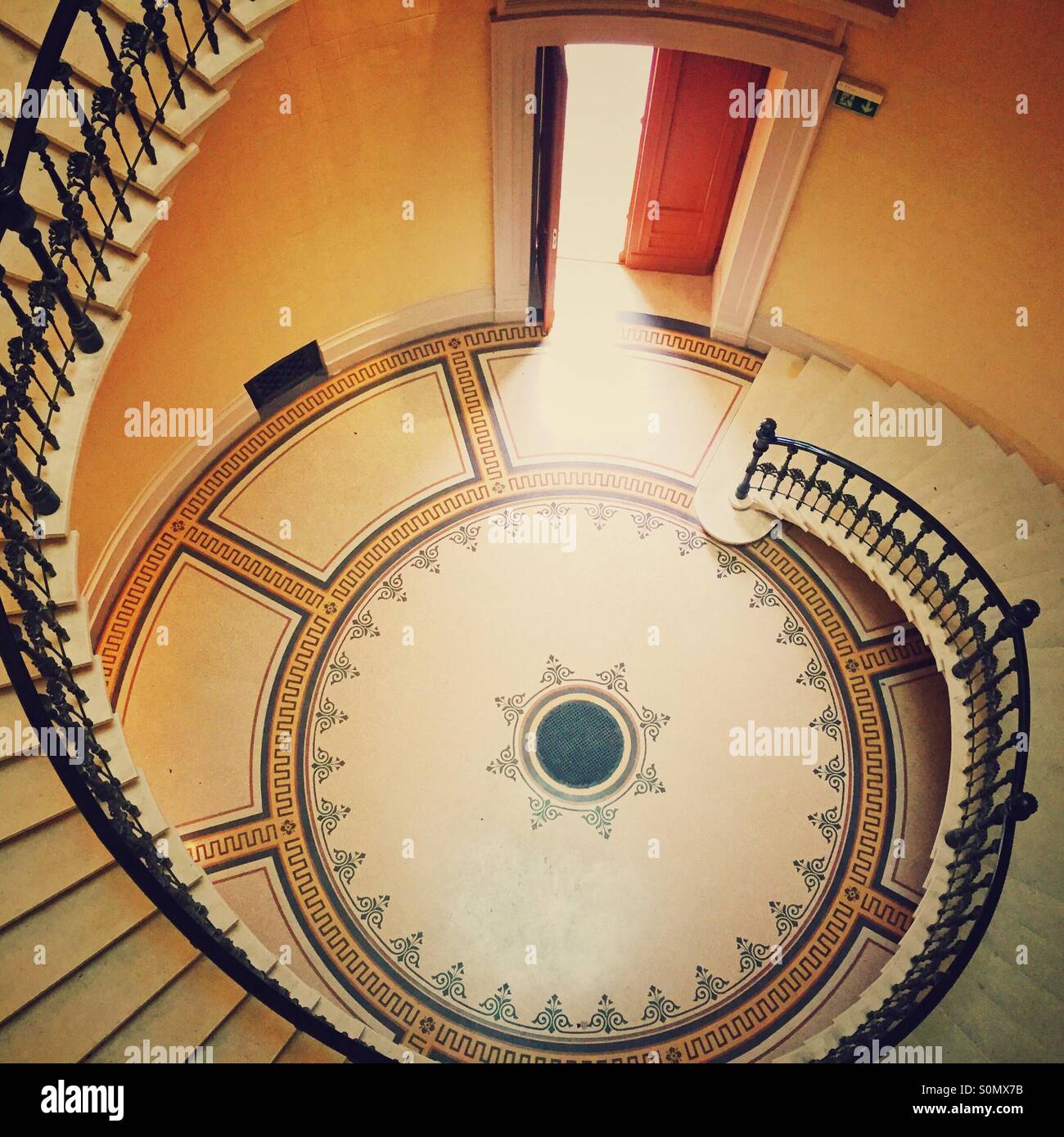 Spiral stone staircase in historic building. - Smartphone Captured Stock Image