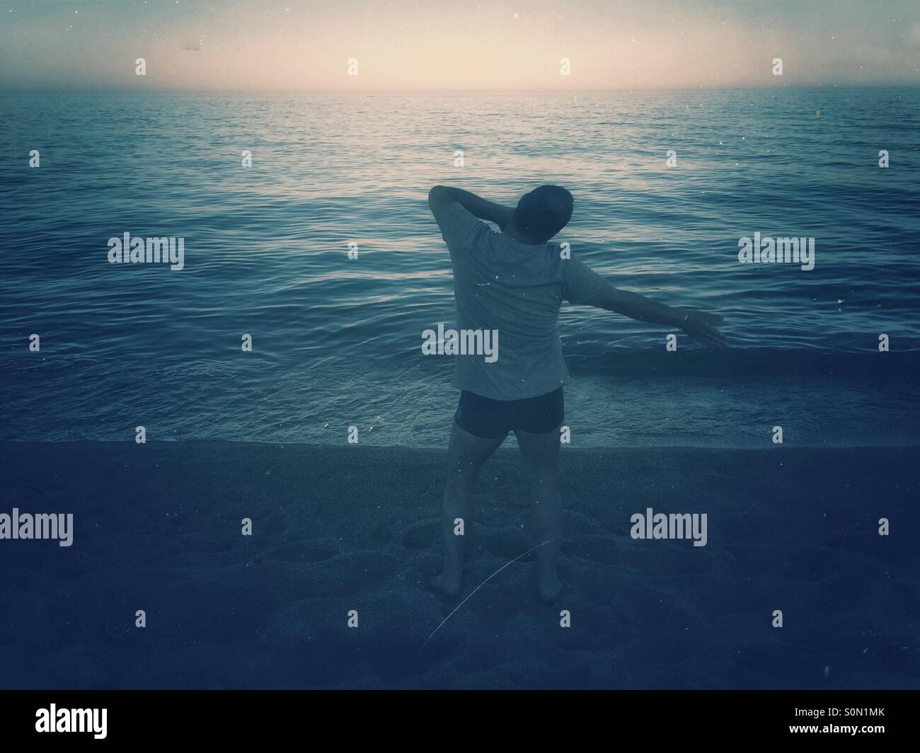 Man sport on beach,blanes,Costa Brava,Spain - Smartphone Captured Stock Image