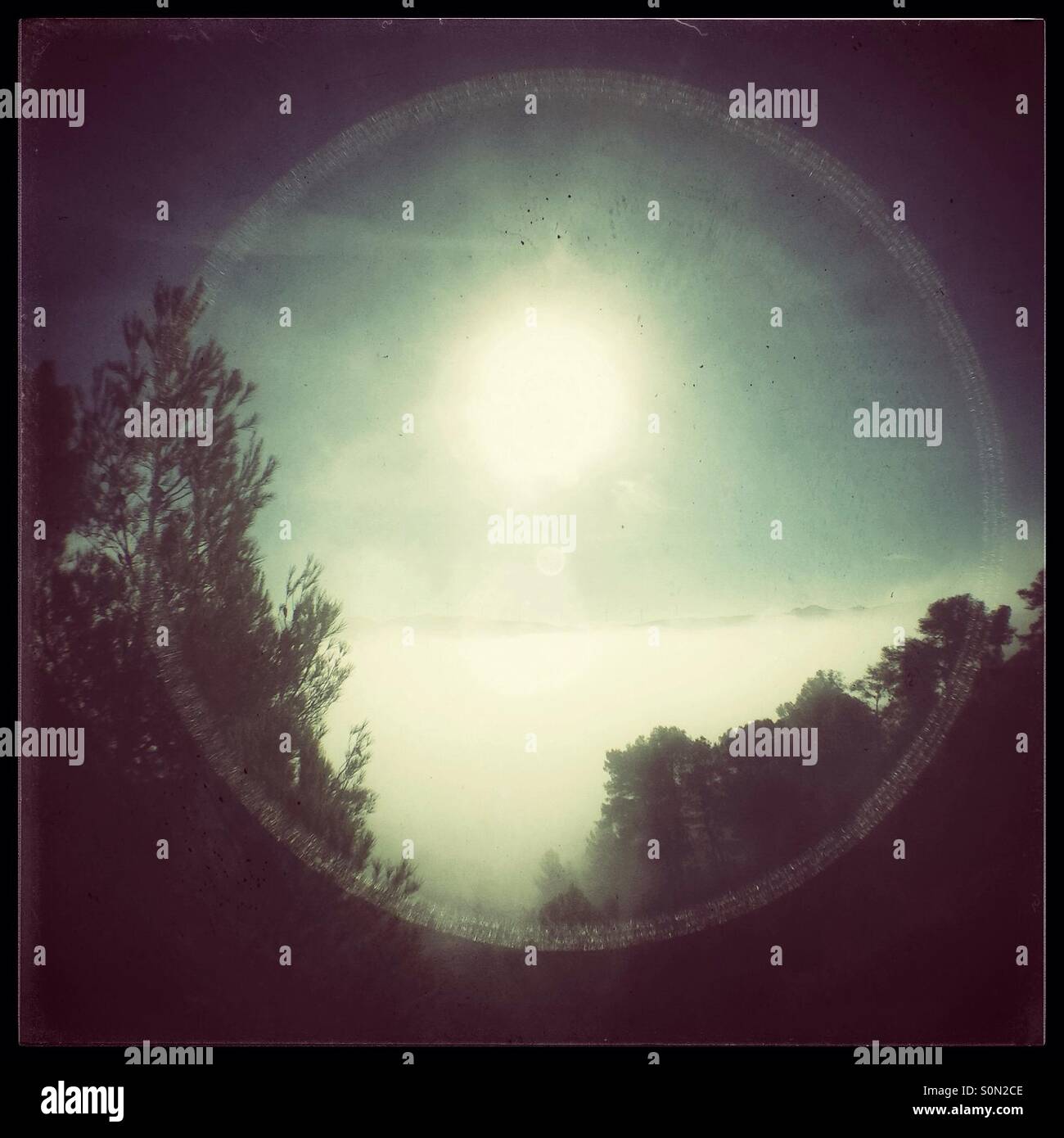 Sun rises above the fog, Catalonia, Spain. - Smartphone Captured Stock Image