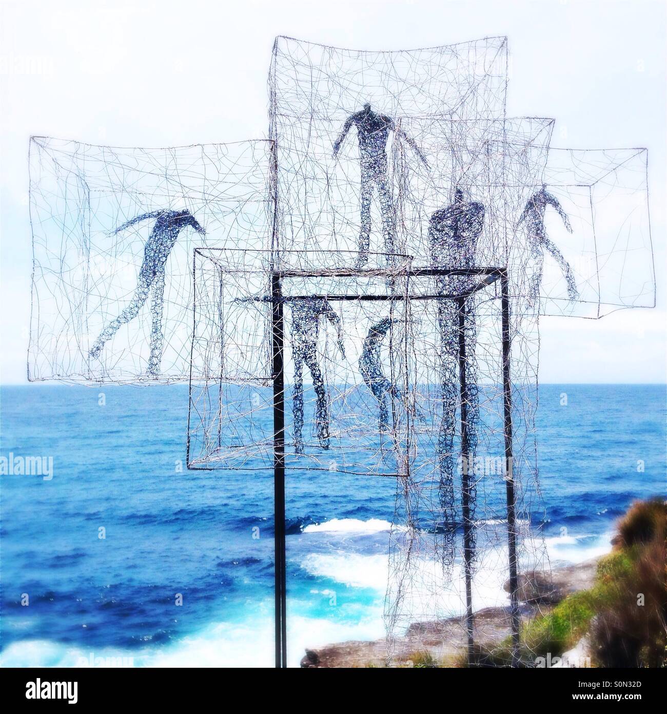 Sculptures of people in boxes at Sculptures by  the sea in Bondi Sydney Stock Photo