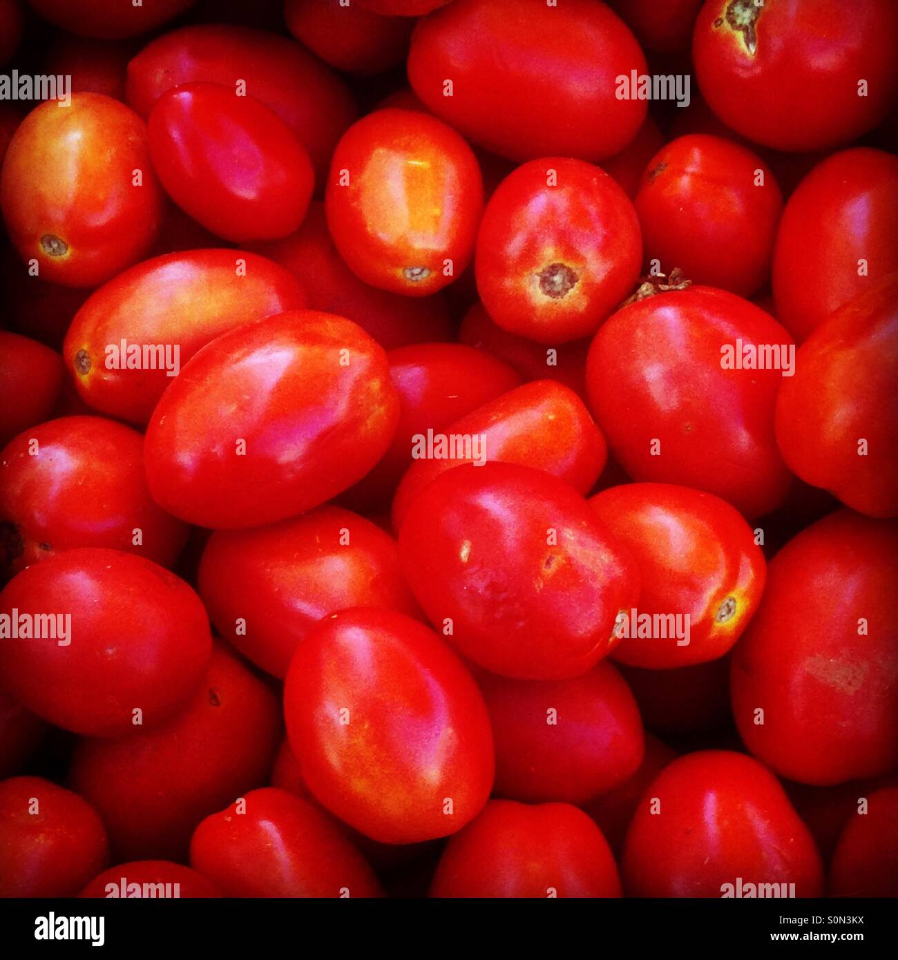 Full frame market stall tomatoes. Mobile phone photo with some phone or tablet post processing. - Smartphone Captured Stock Image