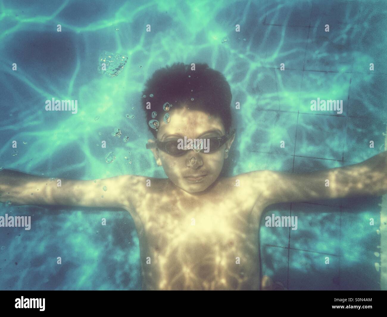 Little boy swimming underwater in the pool Beirut lebanon Middle East Stock Photo