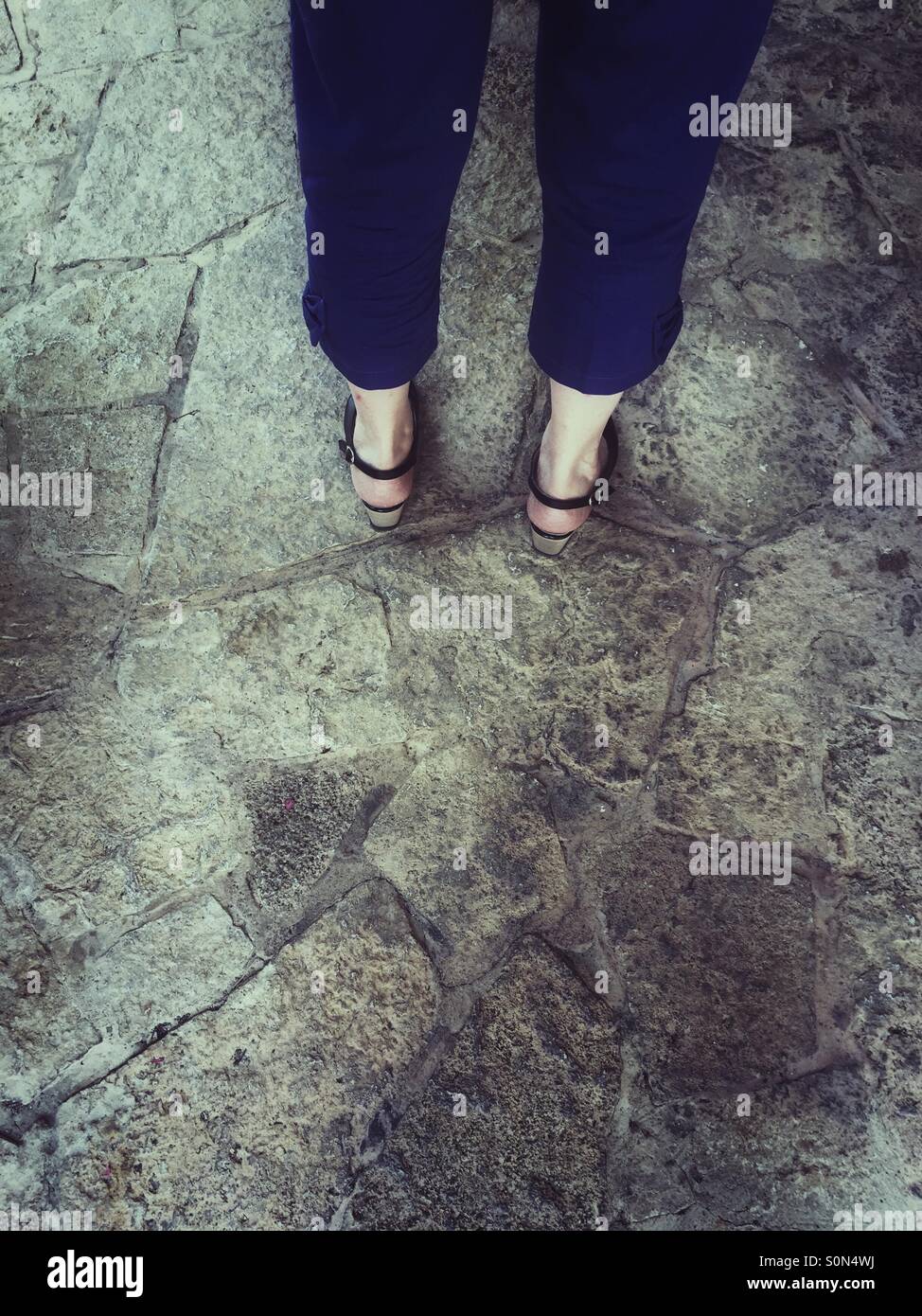 Woman walking outdoors - Smartphone Captured Stock Image