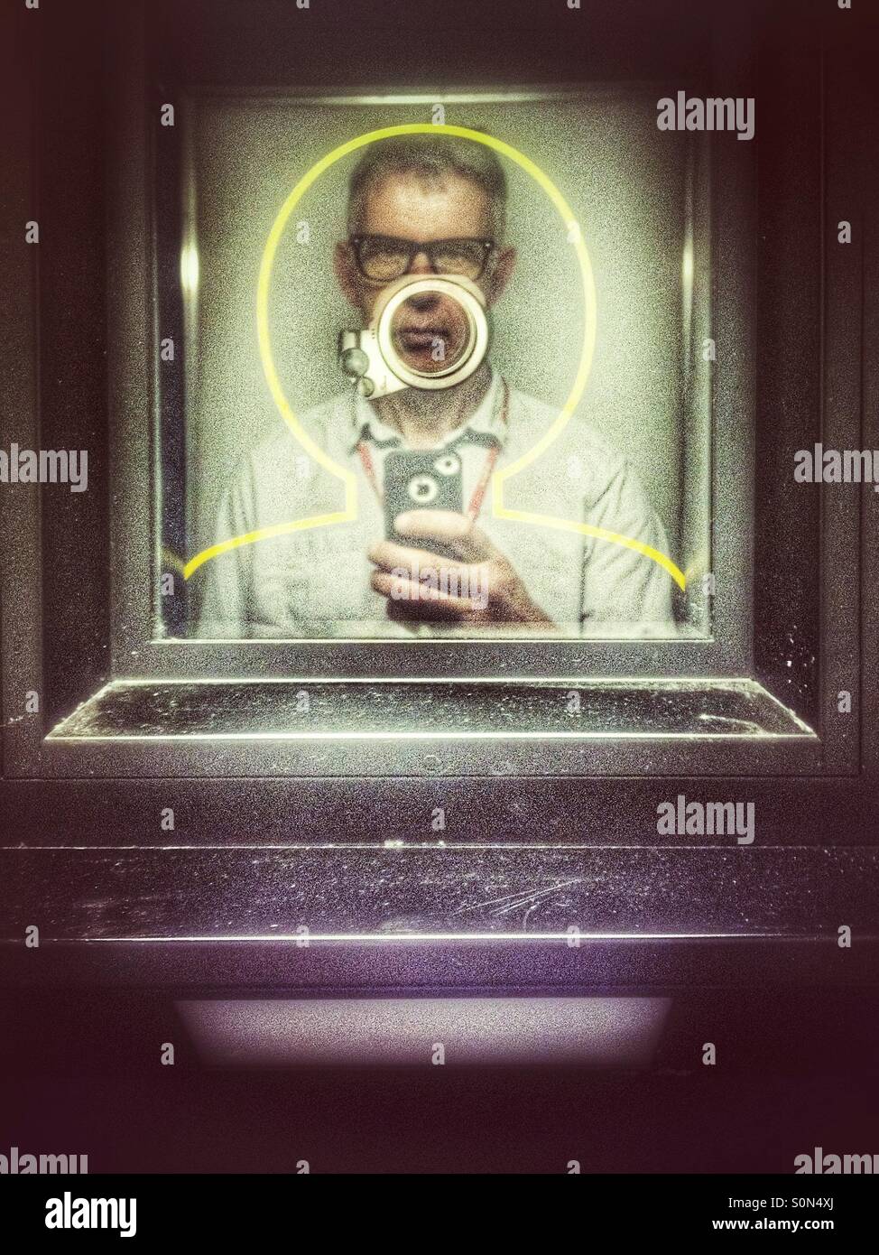Man in a photo booth - Smartphone Captured Stock Image