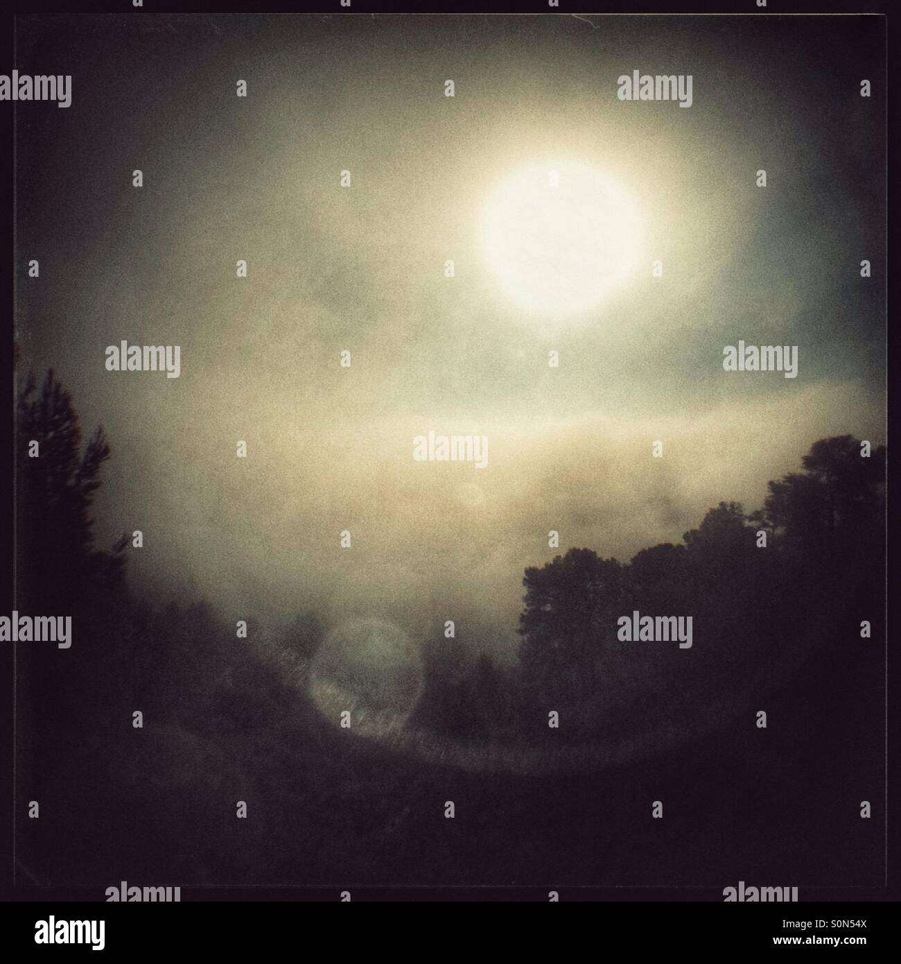 Sun up above the fog in the mountains, Catalonia, Spain. - Smartphone Captured Stock Image