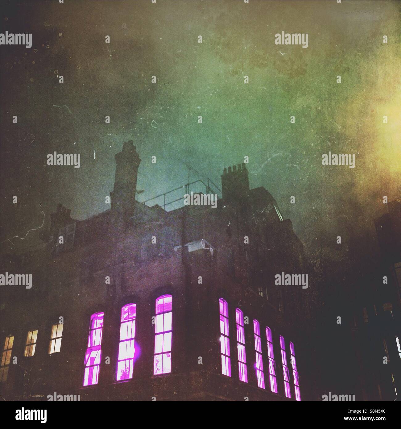 Pink windows in the night - Pink Panda, Borough Market, Winchester Walk, London, UK - Smartphone Captured Stock Image