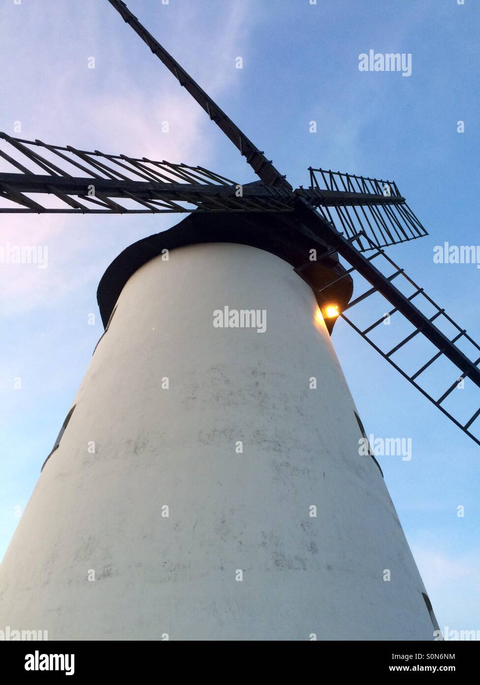 Windmill in golden hour Stock Photo Alamy