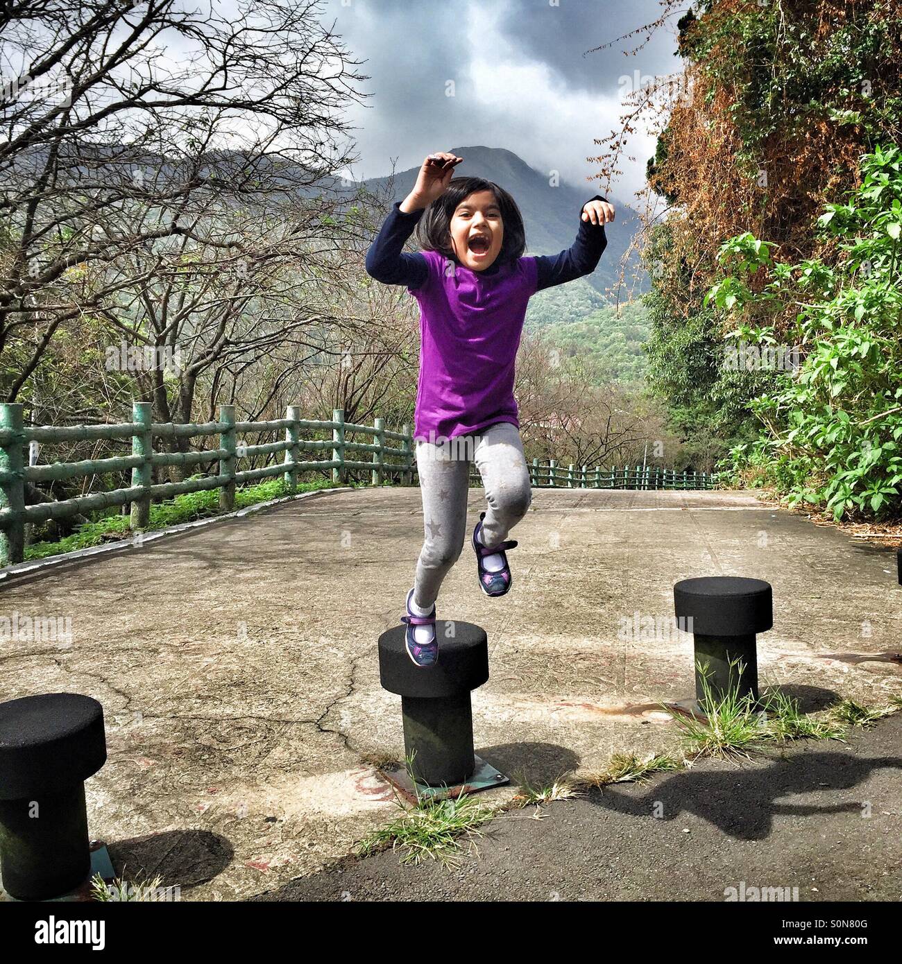 little girl jumping Stock Photo