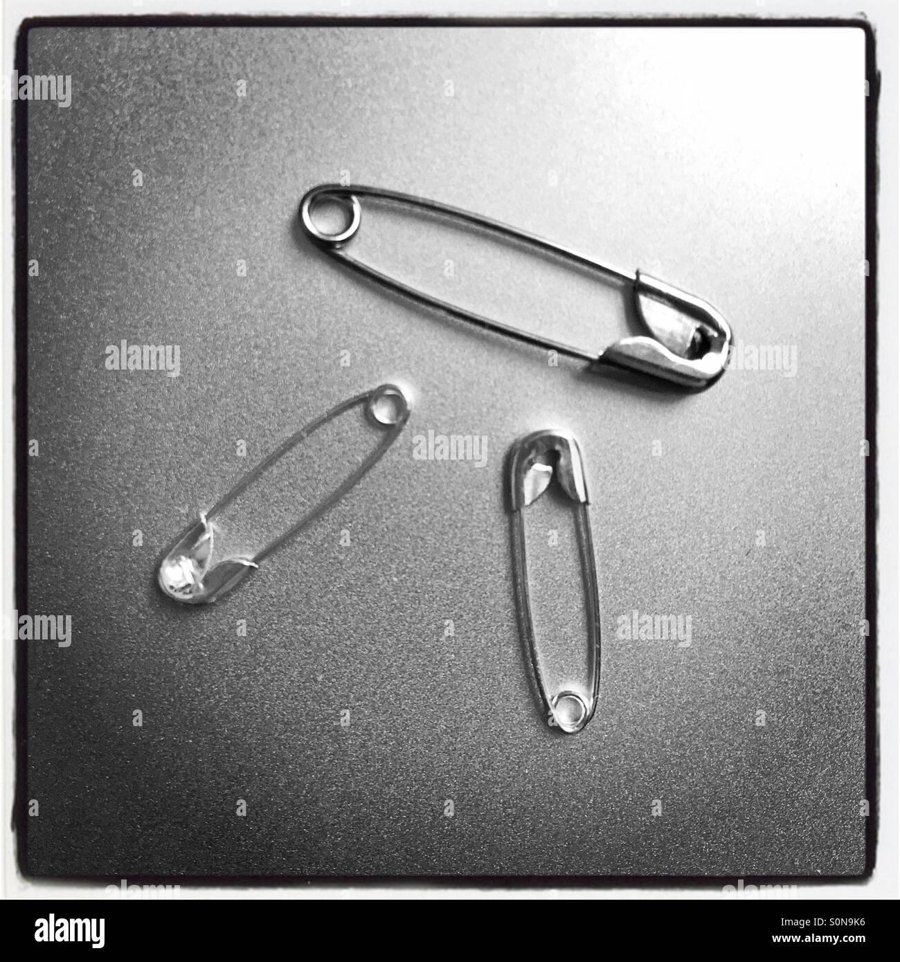 Safety pins hi-res stock photography and images - Alamy