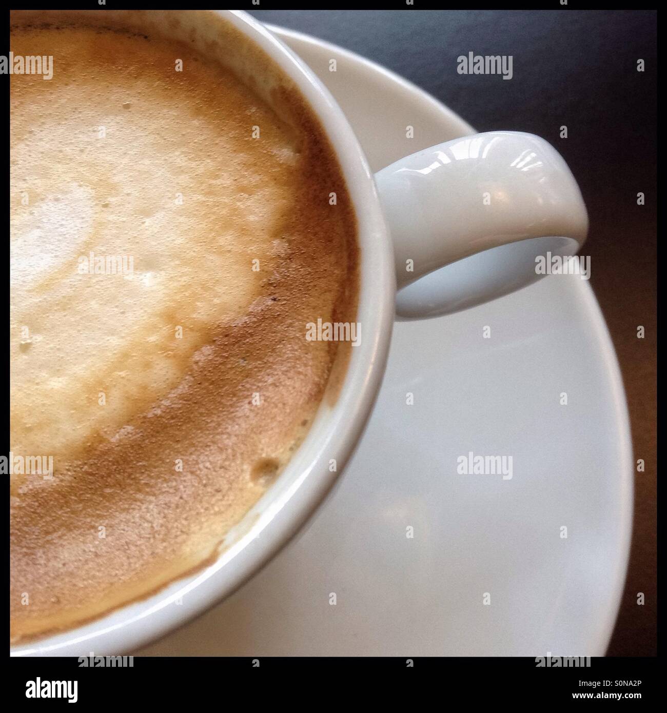 Café con leche [fresh coffee with milk], Catalonia, Spain. - Smartphone Captured Stock Image