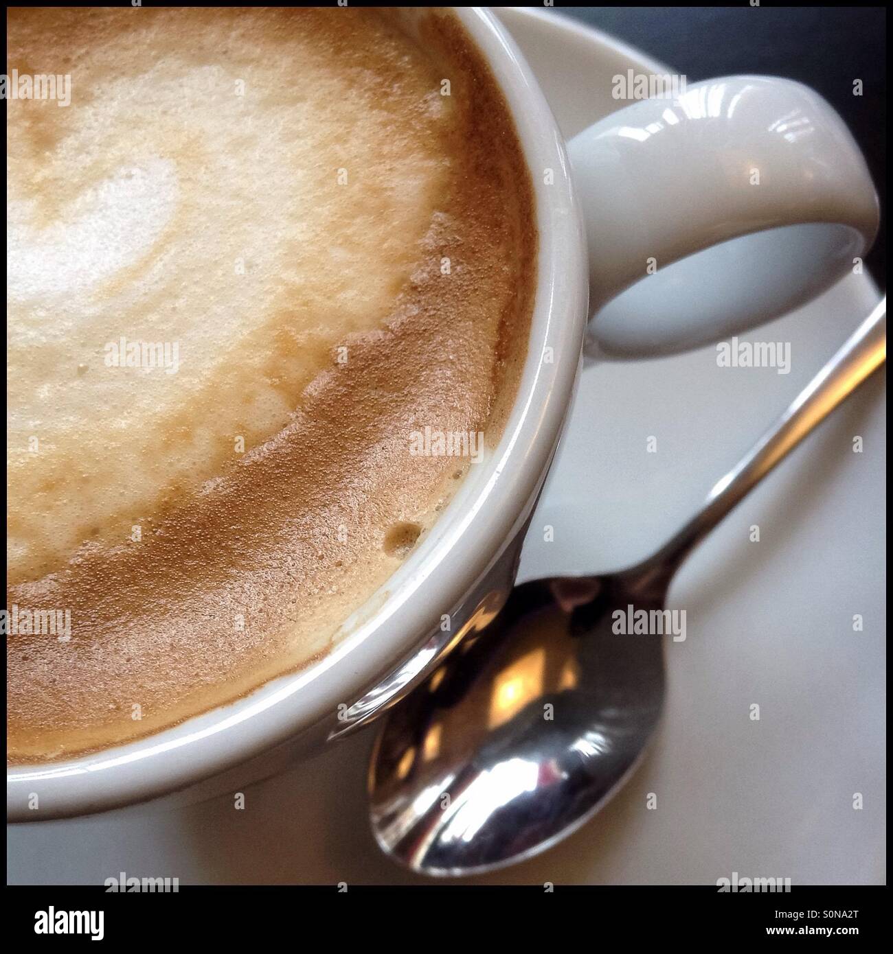 Café con leche [fresh coffee with milk], Catalonia, Spain. - Smartphone Captured Stock Image