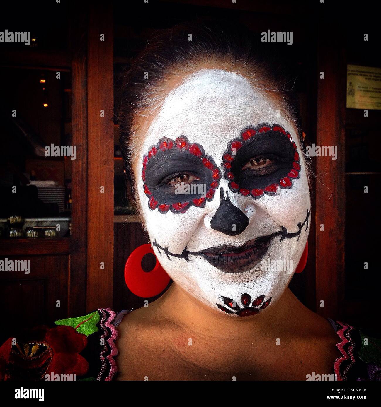 A catrina during Day of the Dead celebrations in San Gregorio Atlapulco, Xochimilco, Mexico City, Mexico - Smartphone Captured Stock Image