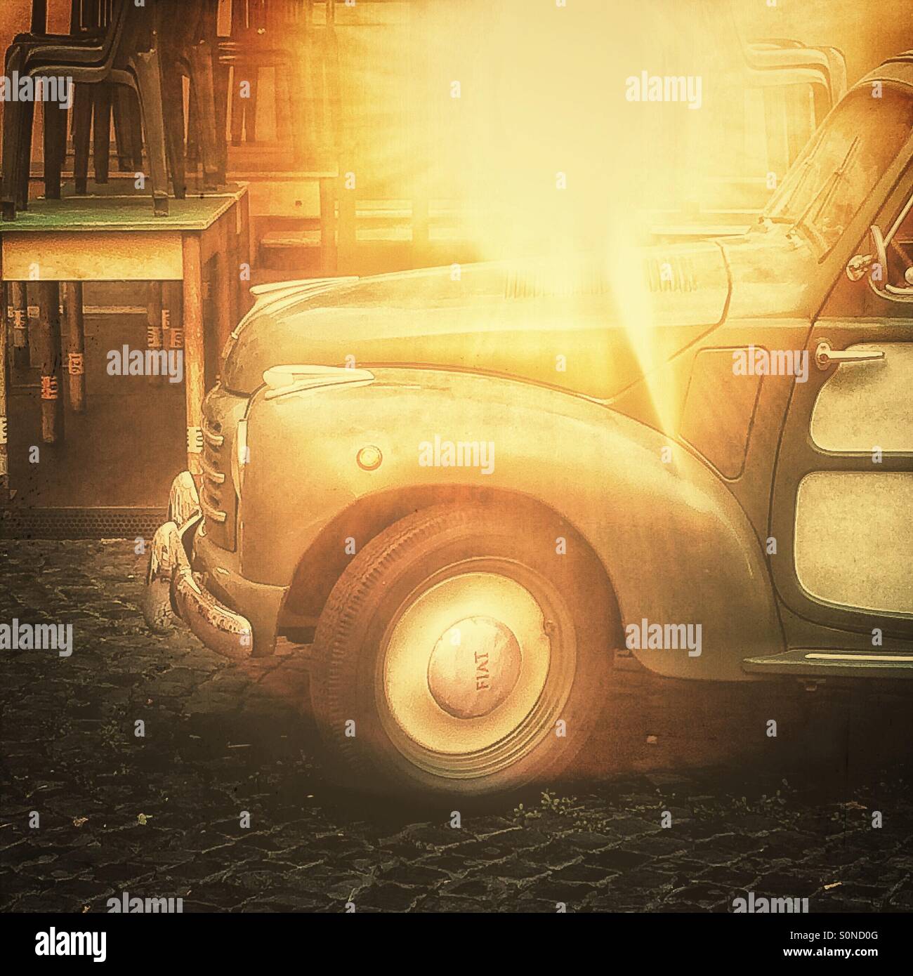 Vintage retro Fiat sun flare - Smartphone Captured Stock Image
