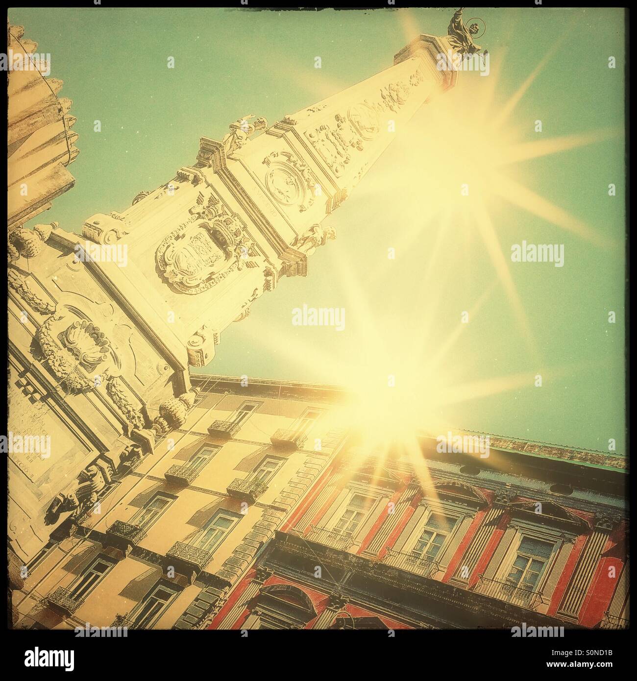 Spire of San Domenico, built between 1656 and 1737 to celebrate end of the plague in Naples - Smartphone Captured Stock Image