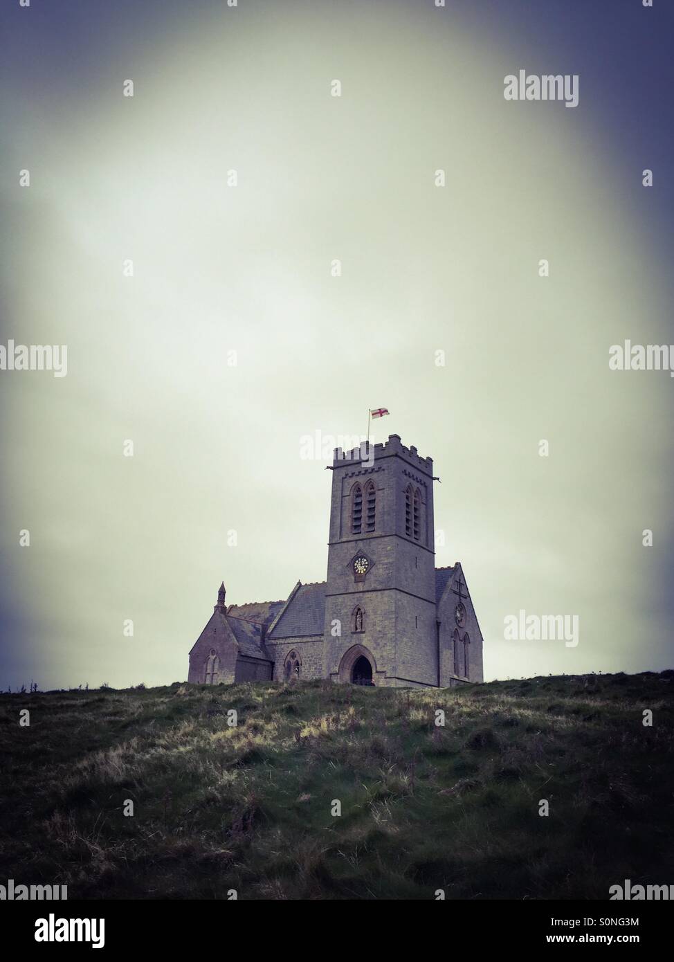 Old English church on a hill Stock Photo
