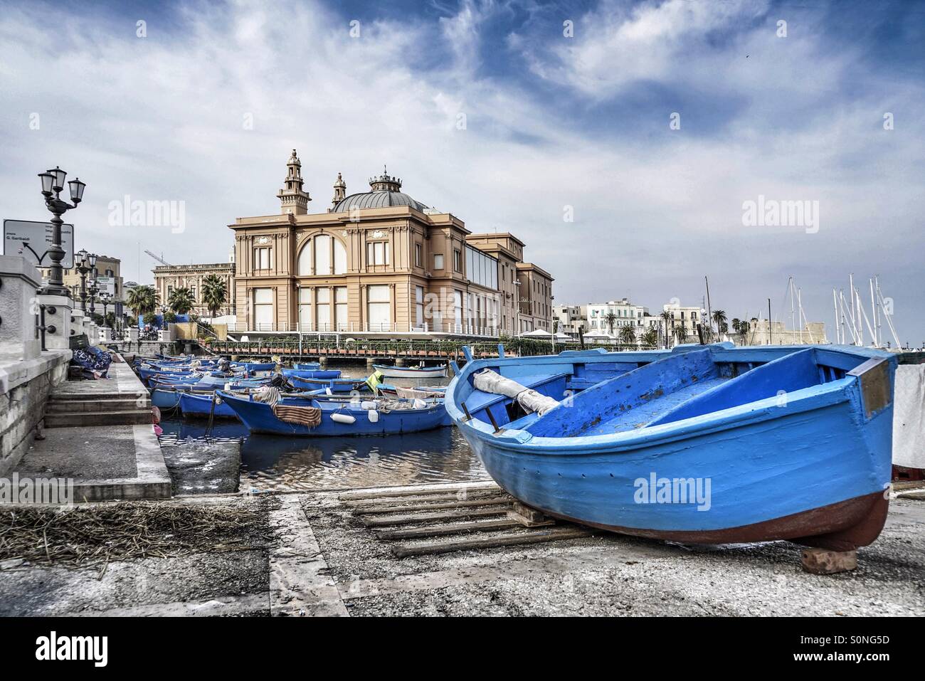 blue fishing boats on port of bari in puglia, italy Stock Photo Alamy