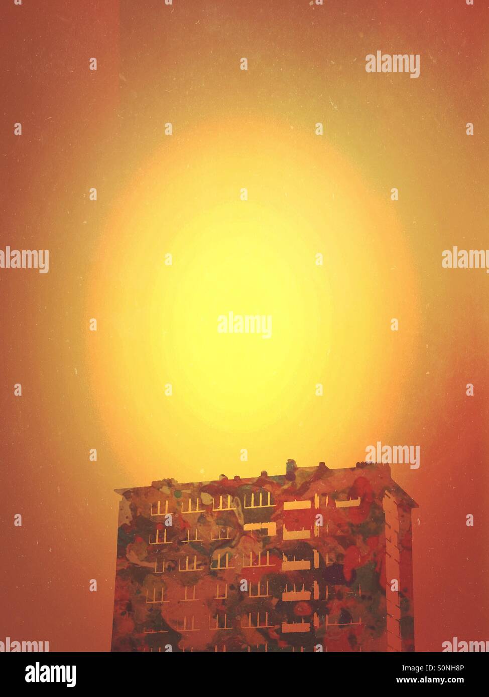Earth is heating up. Lone apartment building under scorching sky. - Smartphone Captured Stock Image