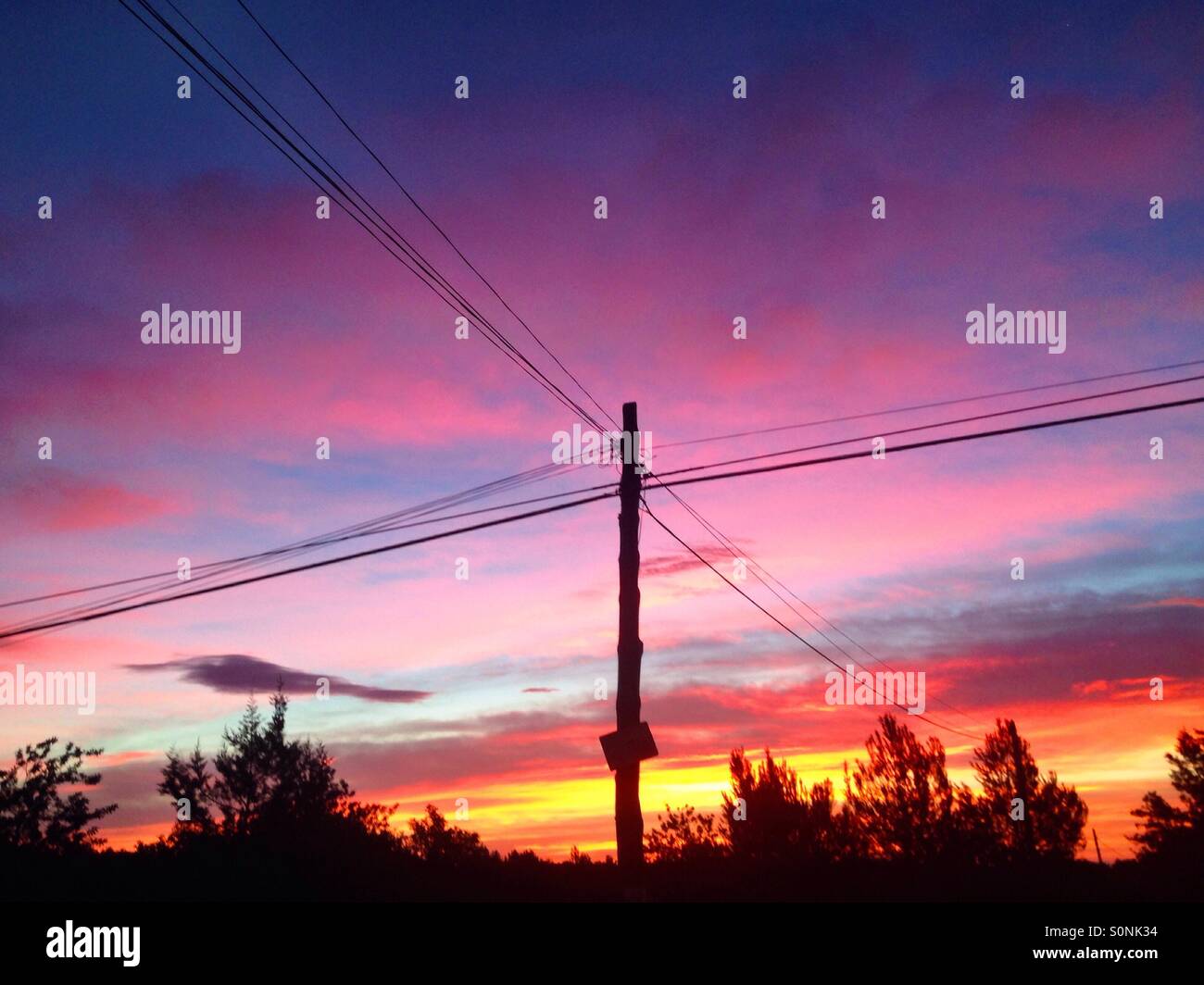 Power lines sunrise Stock Photo