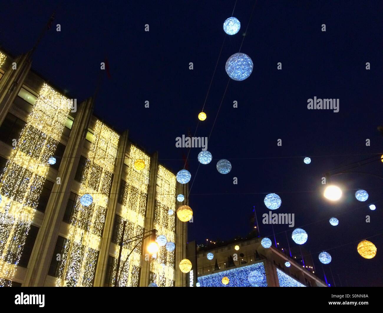 Silver & gold Christmas lights on the House of Fraser building in Oxford  Street London UK Stock Photo - Alamy