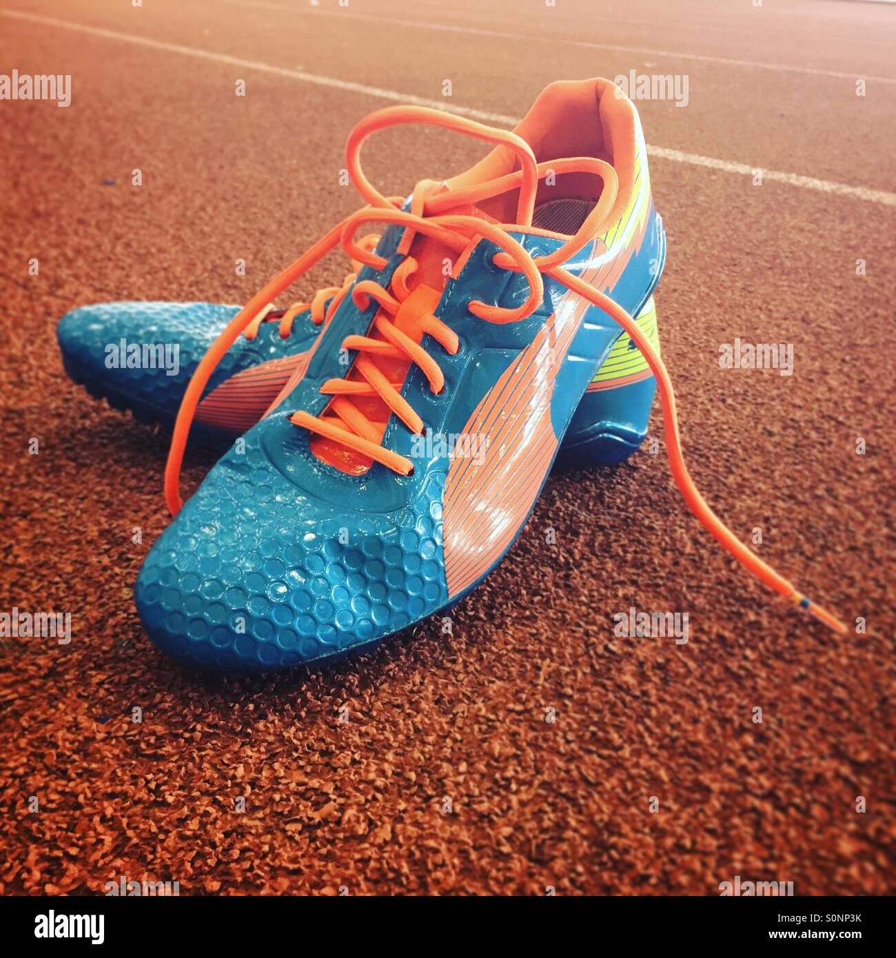 Running shoes spikes hi-res stock photography and images - Alamy