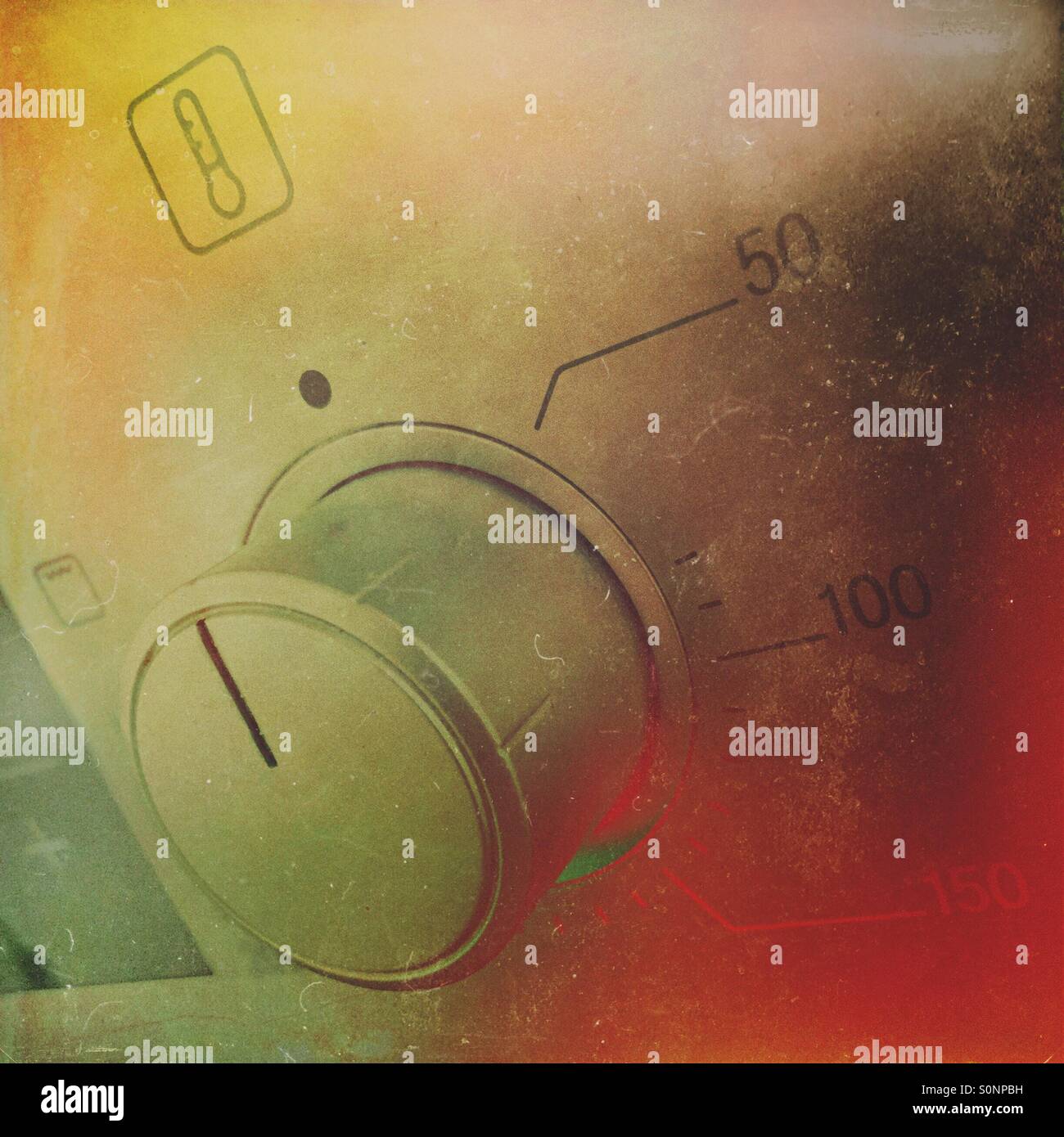 Kitchen oven temperature button and temperature indicators. - Smartphone Captured Stock Image