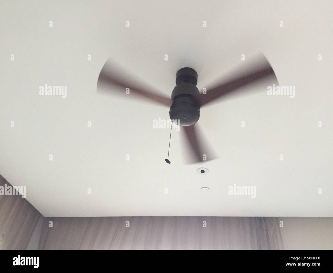 Ceiling fan in action Stock Photo