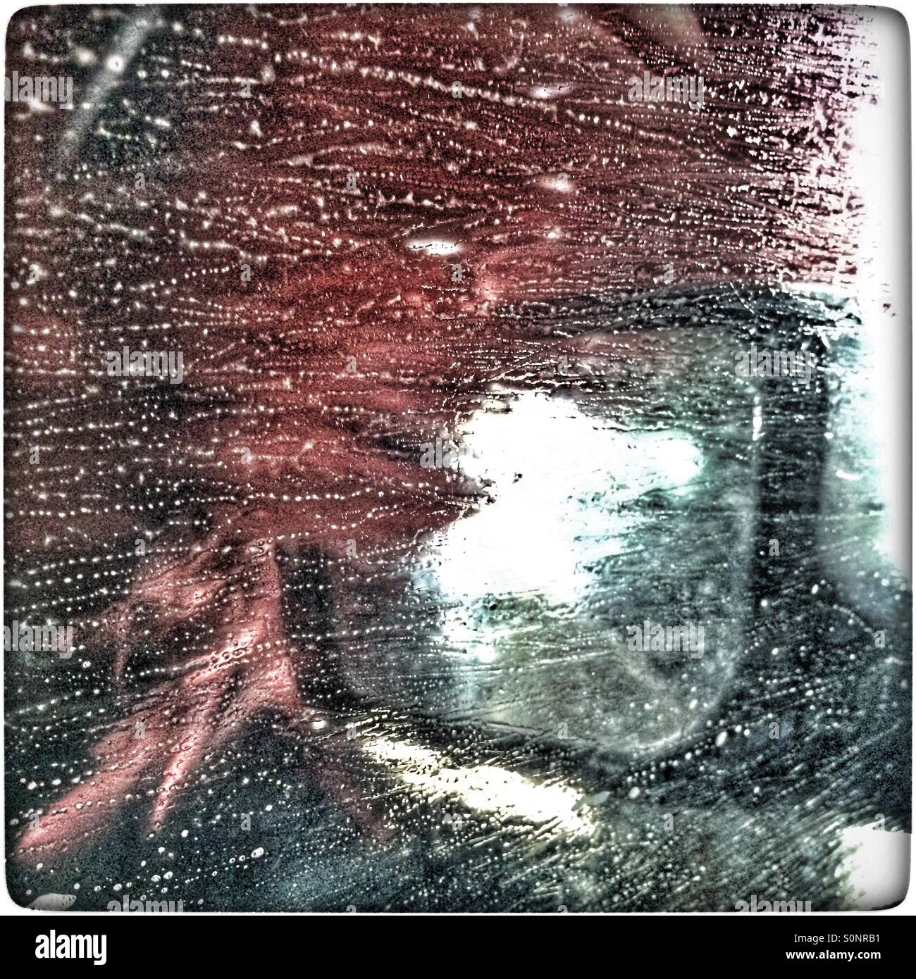 Side mirror being cleaned in careash. - Smartphone Captured Stock Image