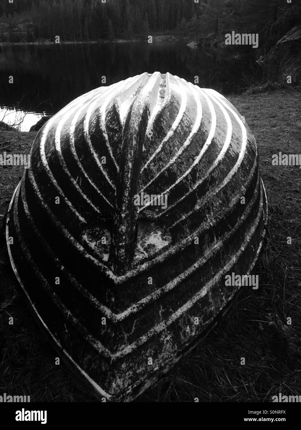 Black and white photo of a dinghy turned upside down Stock Photo Alamy