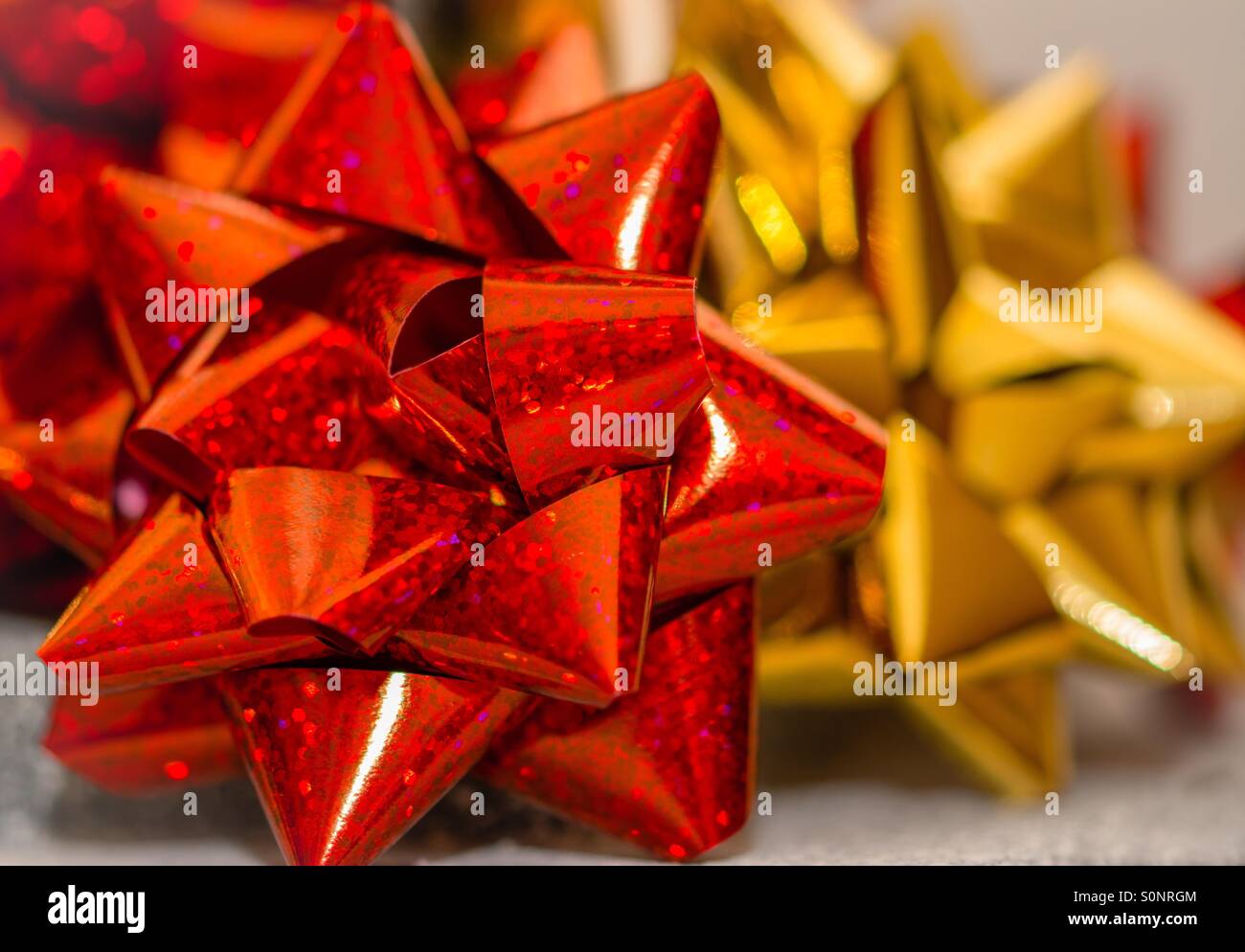 Red Christmas gift bow - Smartphone Captured Stock Image