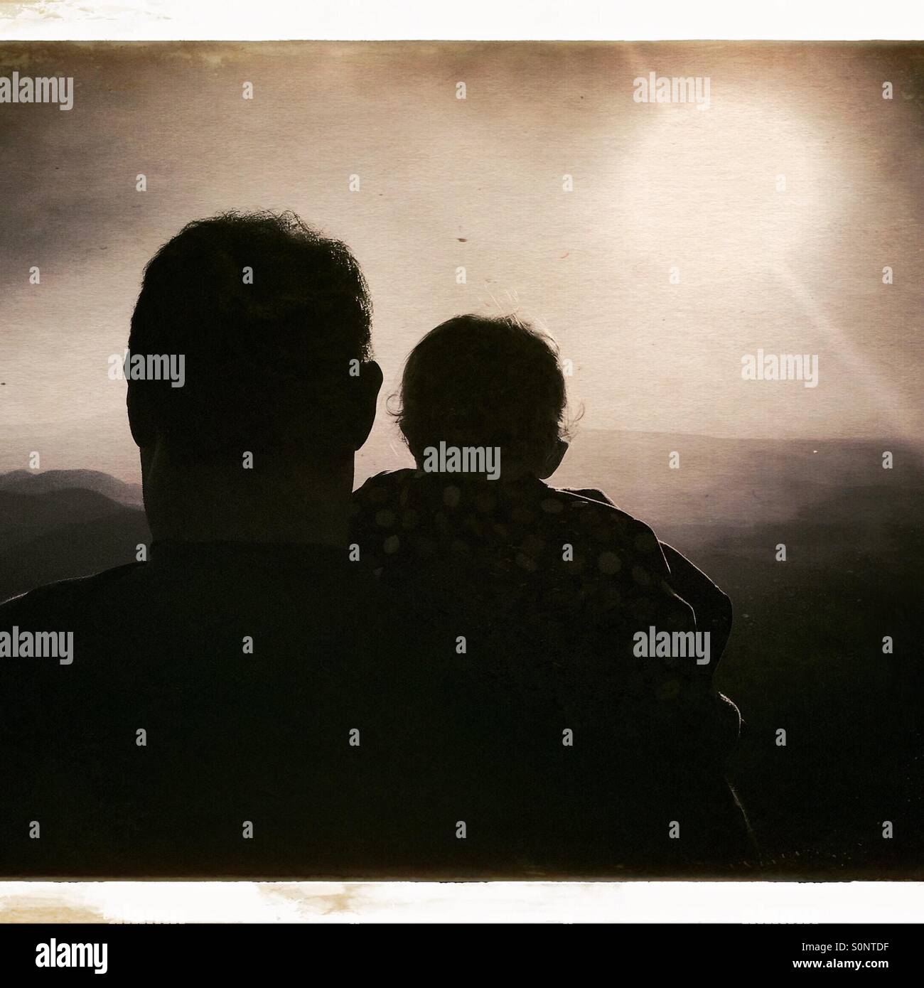 Father. View Rear view of father and infant Stock Photo - Alamy