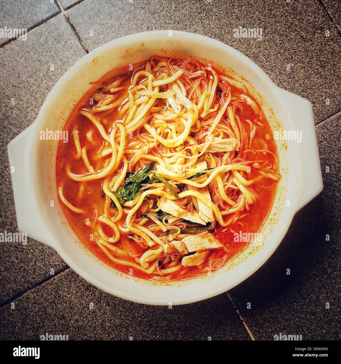 Malaysian prawn and chicken noodle soup - Smartphone Captured Stock Image