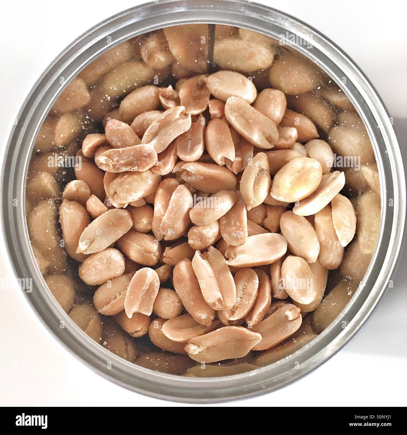 Salted peanuts in a can Stock Photo Alamy