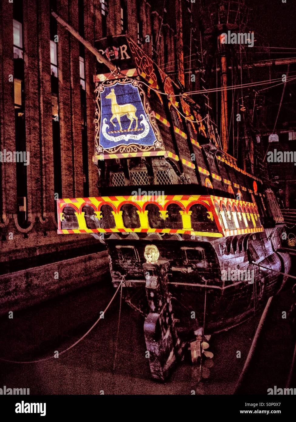 Night time image of  the Stern of the replica Golden Hind on the South Bank of the Thames near London bridge. - Smartphone Captured Stock Image
