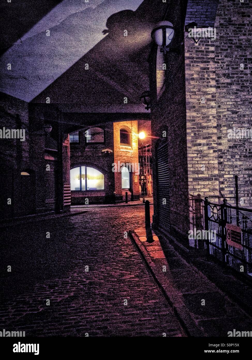 Night-time image of an  Alley in the Old wharf District, Southwark, London - Smartphone Captured Stock Image