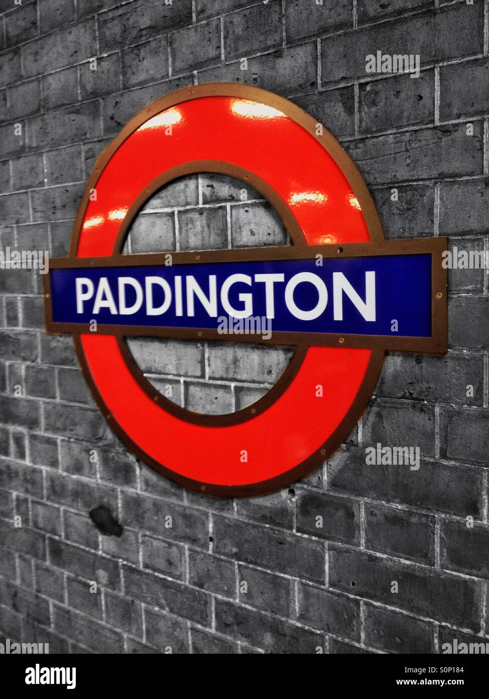A Paddington London Underground station sign Stock Photo Alamy