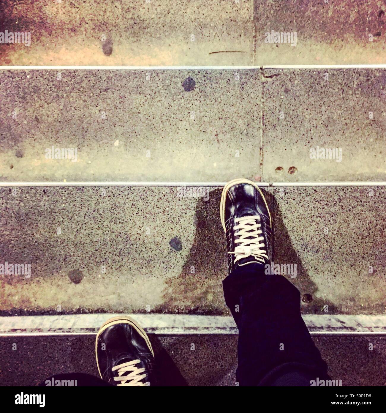 Walking down the stairs hi-res stock photography and images - Alamy