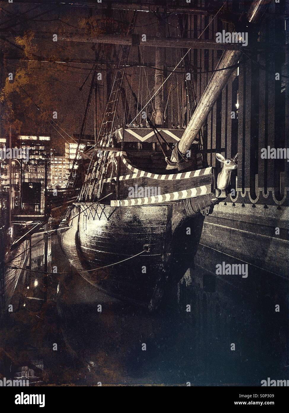 Night time image of the Bow of the Replica Golden Hind in St Mary Overie Dock, near London Bridge - Smartphone Captured Stock Image