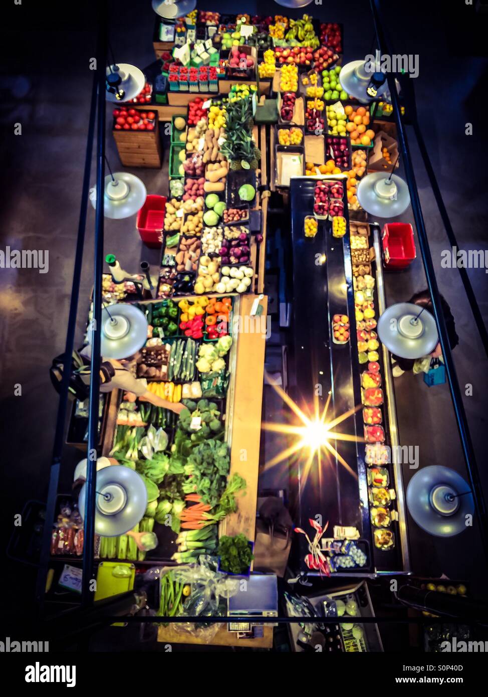 Fruits and veggies at an indoor market, view from above, Ontario, Canada. Colorful display. Waiting for customers. Nature’s bounty. Local. - Smartphone Captured Stock Image