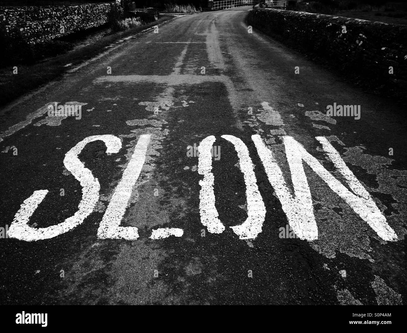 Slow warning on a country road in the Cotswolds UK - Smartphone Captured Stock Image
