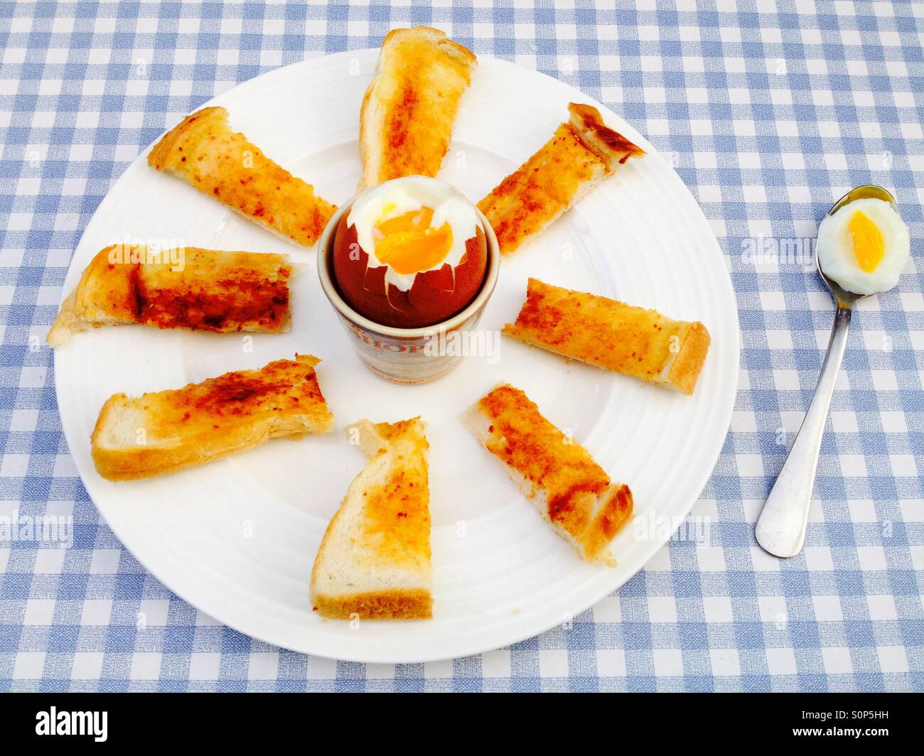 Soft boiled egg with toasted soldiers - Smartphone Captured Stock Image