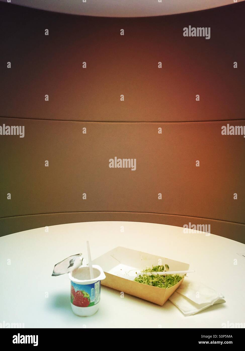 Lunch alone in the office - Smartphone Captured Stock Image