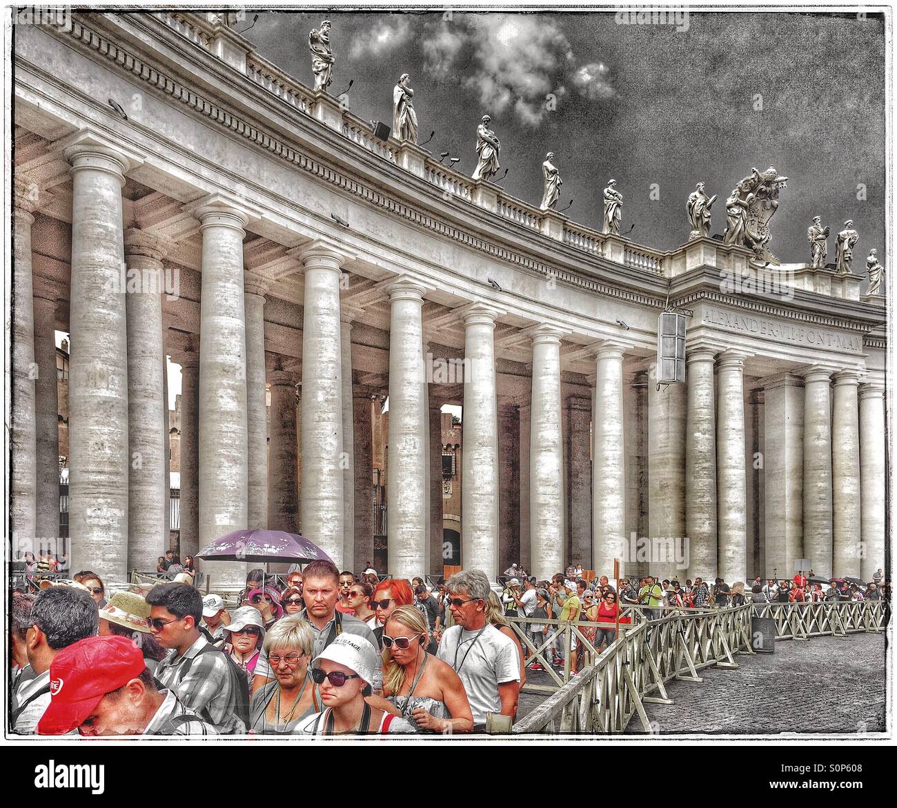 Tourists queue in St. Peter's Square as they wait to see St. Peter's Basilica & the Vatican Museum, Rome, Italy. Bernini's Colonnades are a feature of St. Peter's Square. Photo Credit-© COLIN HOSKINS. - Smartphone Captured Stock Image