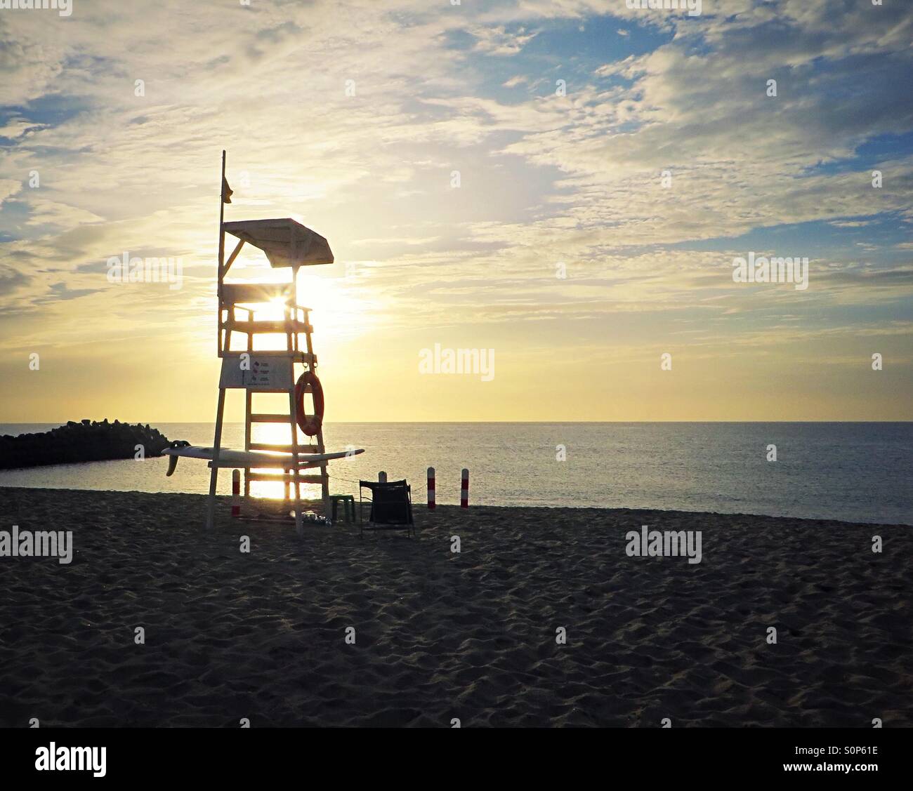 Sunlight at sunset through a lifeguard station - Smartphone Captured Stock Image
