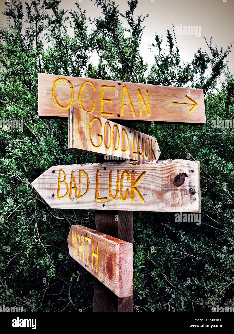 Directions at the fork in the road Stock Photo Alamy