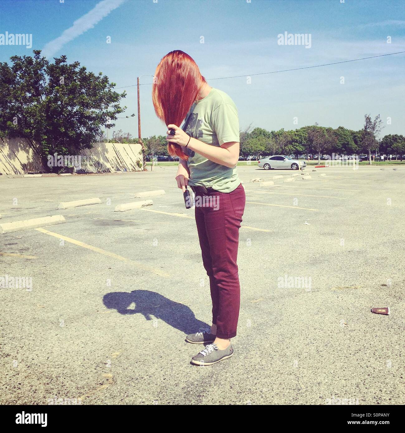 Girl with red hair - Smartphone Captured Stock Image