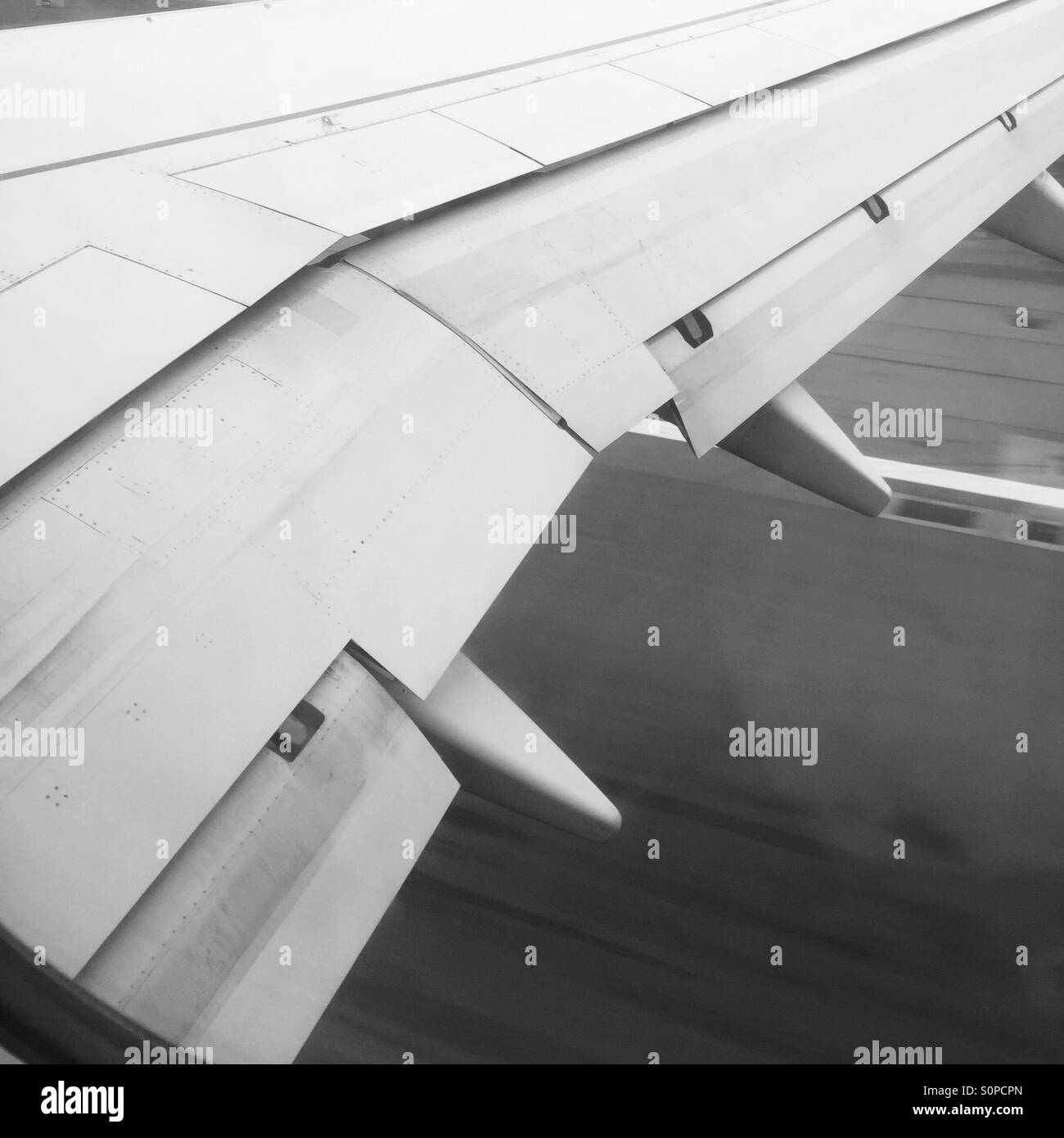 Plane landing Black and White Stock Photos & Images - Alamy
