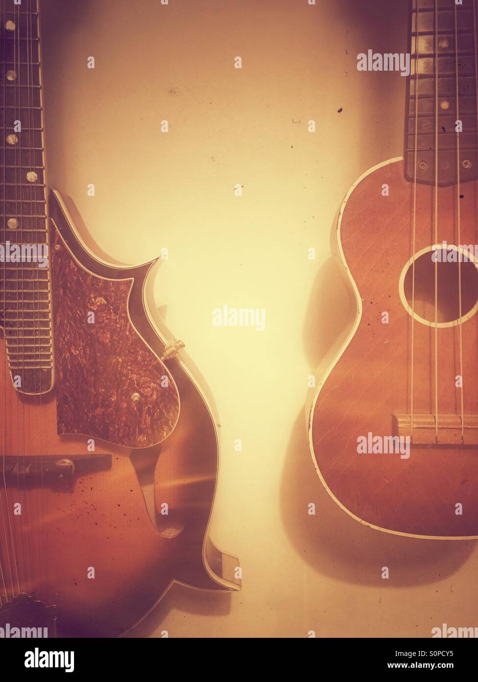 Vintage ukulele and guitar - Smartphone Captured Stock Image