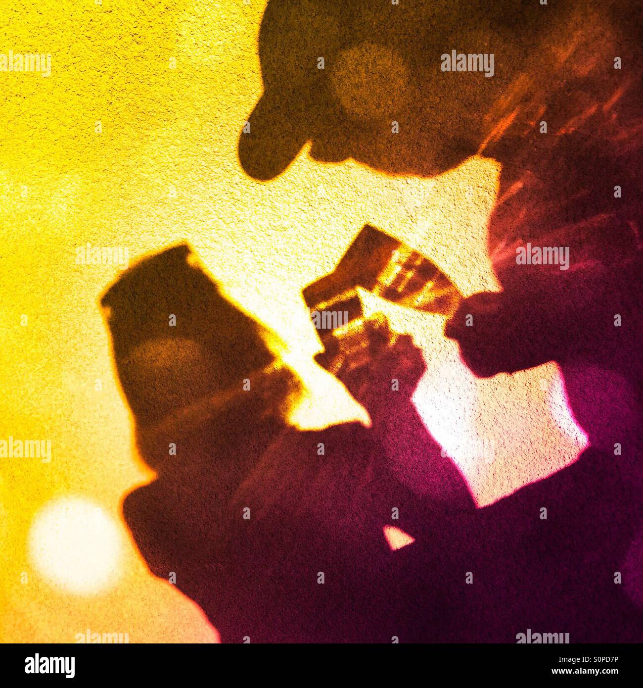 Shadow of a couple making a champagne toast with a filter applied - Smartphone Captured Stock Image