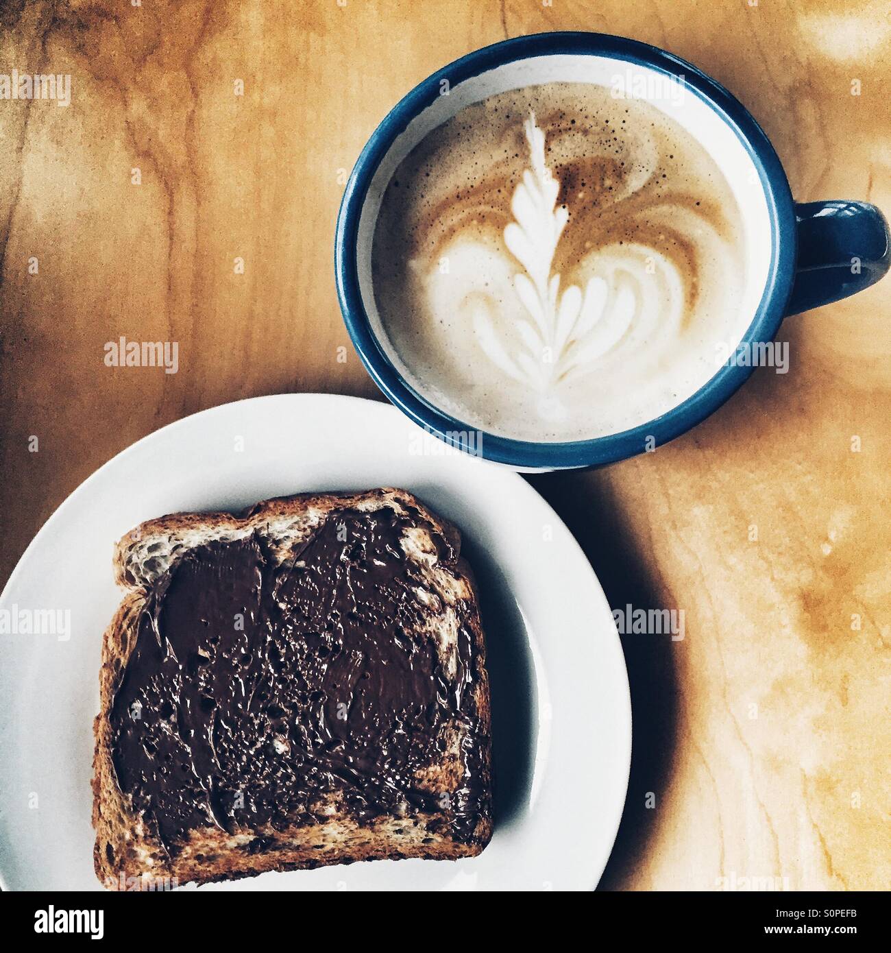 Latte and hazelnut sandwich Stock Photo